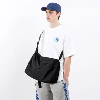 Jauns vīriešu ikdienas personības pleca soma lielas ietilpības jauniešu modes gadījuma messenger jūra zīmolu vīriešu soma
